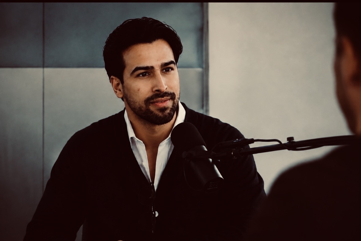 Sam Pattisapu in conversation during a podcast interview